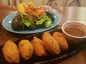 Fritters and a burger at Broccoli Revolution - Sukhumvit Rd in Bangkok