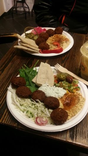 מנה צמחונית ומנה טבעונית at Zatar Falafel & Hummus in Vilnius