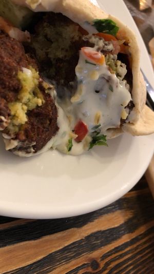 Pita falafel with vegan tahini mayo and fresh veggies at Zatar Falafel & Hummus in Vilnius