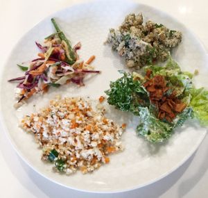 Plate of salad samples at Commodity Juicery. at Commodity Juicery in Vancouver