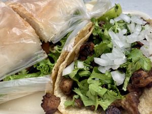 Torta de milanesa con salchicha y taco de suadero  at Gatorta - Food Stand in Mexico City