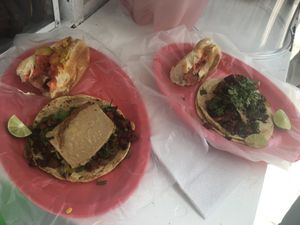 hot dogs, and almond cheese on top of tacos at Gatorta - Food Stand in Mexico City