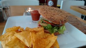 'speedy gonzales' burger with tortilla chips and cola soft drink at Video Video in Copenhagen