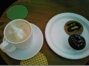 Vegan Cappuccino with Chocolate Muffin & Peanut Butter Cookie. at New Leaf Cafe in Tampa