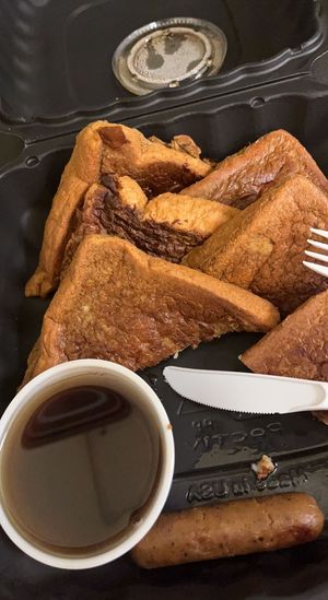 French toast with sausage   at New Leaf Cafe in Tampa