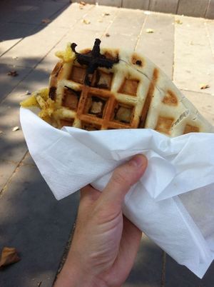 Savoury waffle with vegan cheese, ham, caramelised onions and provencal herbs at WafflesVeg in Paris