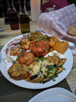 Vegetarian plate with several dishes from vegetarian menu page at Kellari in Crete