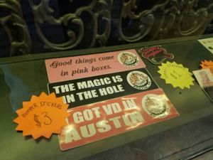 bumper stickers at Voodoo Doughnuts - E 6th St in Austin