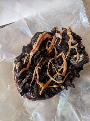 Vegan Old Dirty Bastard - Chocolate glaze with oreos and peanut butter drizzle at Voodoo Doughnuts - E 6th St in Austin