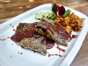 Milanesa de ajonjolí rellena acompañada de salsa de la casa y papas   aratoga  at Mi Dulce Jacalito in Mexico City