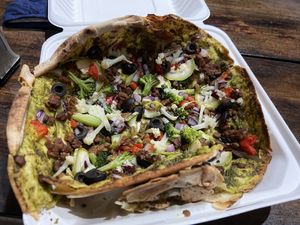 Vegan pesto pizza at Mama Toucan's Organic and Natural Food Store in Dominical