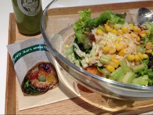 'Green/yellow' smoothie, 'orange' wrap, and French salad. at Ginza Raw Life Cafe in Tokyo