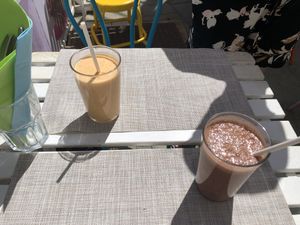 Orange one is passion fruit and the brown one is chocolat and banana   at H2O Juice Bar & Vegan Cafe in Fuerteventura