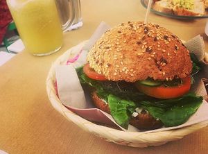 The delicious spinach burger 🍔😍 at H2O Juice Bar & Vegan Cafe in Fuerteventura