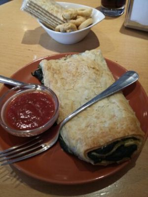 Spinach strudel with tomato sauce at Alte Muhle in Merano