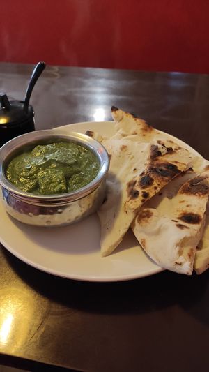 Tofu palak paneer and vegan naan at Aniyor Vegetarian Restaurant in Kathmandu