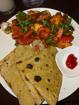 Vegan tofu breakfast with jam on the side at Aniyor Vegetarian Restaurant in Kathmandu