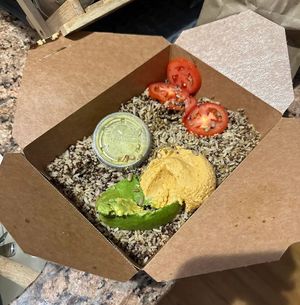 Ordered the avocado delight over quinoa/rice. This is what I got… Looks like bird food. $14 for what? half an avocado and some dressing?  at InfusionTea in Orlando