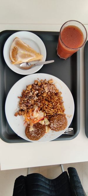 Tofu and lentils mix, ginger beetroot juice and choc cake at Escolha Natura in Lisbon