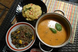 banana curry (top left), lentil salad (bottom left), basil and tomato soup (right)
 at Jam-me in Viseu