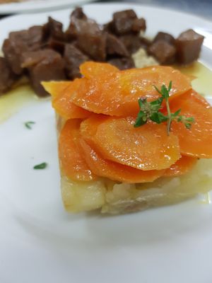 Our Home made braised seitan  with carrots and turnips at Il Cardo e l'Ortica in Mondovi