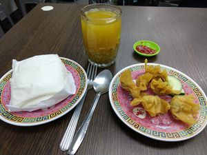 BBQ pork boa and wanton and barley tea at Wonder Chef's Veggie in Kuala Lumpur