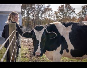 Volunteer Amber with Wilson. at Peak Animal Sanctuary in Freedom