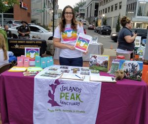 PEAK attends outreach events throughout the year. Volunteer Amanda rocks!! at Peak Animal Sanctuary in Freedom