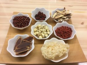 Showing the different herbs used in the Kam Po soup.  at Seven Bells Cafe in Tachikawa