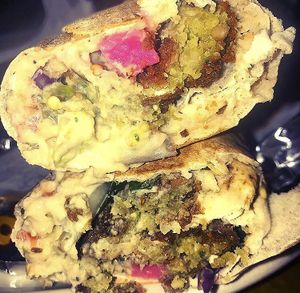 Baba Falafel Rolled Pita at Aladdin's Eatery - Grandview in Columbus