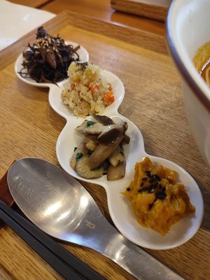 Side dishes served with the curry at Gomacro in Kyoto