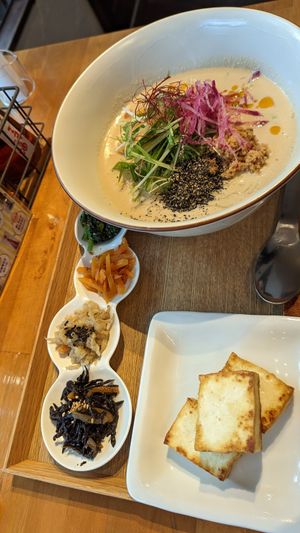 Seasonal noodles with an extra of fried tofu at Gomacro in Kyoto
