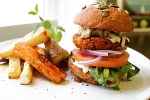 Our house made Falafel Burger, smothered in our cashew tzatziki sauce, almond feta cheese, & fresh veg on our freshly baked spelt bun! at Bliss Kitchen in Waterdown