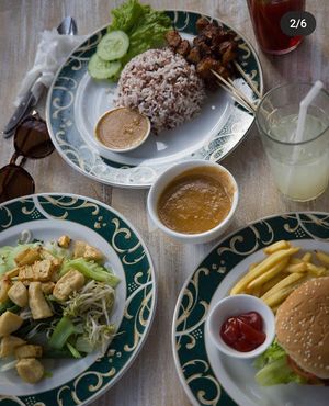 All Pure vegan and allium free. Delicious Satay with brown rice and peanut sauce.. burger and gado-gado. at Giridhari in Kuta