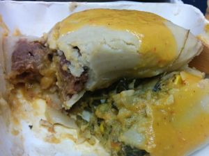 Delicious vegan tamales, with sauce. at Guudbelly in Houston