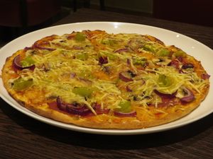 Pizza Vegetarisch with vegan meat instead of chillies (vegan) at Kami Express in Saarbrucken