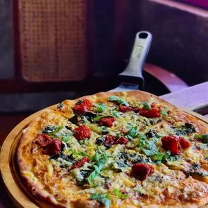 Delicious pizza from sprouted whole wheat flour with a medley of toppings! at Terrasen Cafe in Hyderabad