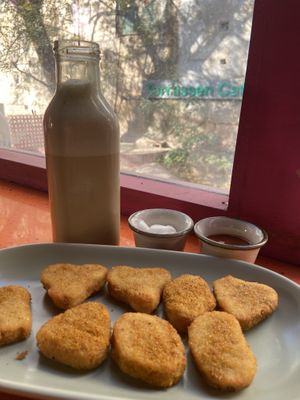 Nuggets and ice coffee with oat milk  at Terrasen Cafe in Hyderabad