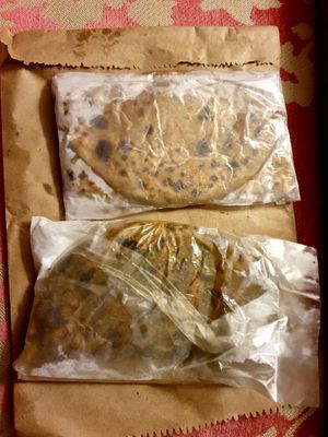 Parathas all green and the tofu one at Terrasen Cafe in Hyderabad