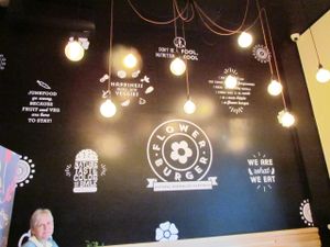 The interesting wall inside at Flower Burger - Viale Vittorio Veneto in Milan