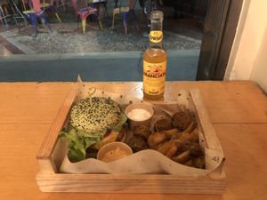 Jungle BBQ burger with savory fries and flower bombs  at Flower Burger - Viale Vittorio Veneto in Milan