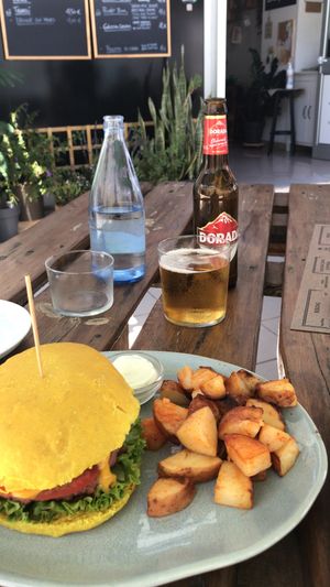 Special burger with potatoes   at BuenaVida Vegan in Tenerife