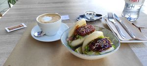 Pan Bao: Bao bun with avocado sauce, lettuce mix, marinated sticky tempeh and lime at BuenaVida Vegan in Tenerife