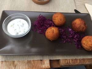 Potato croquettes served with red cabbage  at BuenaVida Vegan in Tenerife