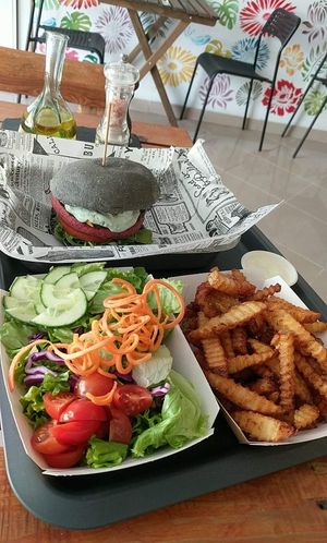 Think pink burger with fries, mayo and salad at BuenaVida Vegan in Tenerife