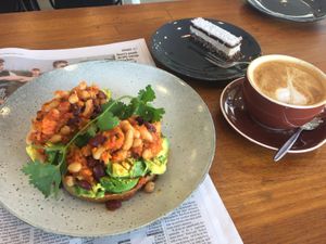 House beans, bounty slice, almond milk latte at Raw & More in Semaphore