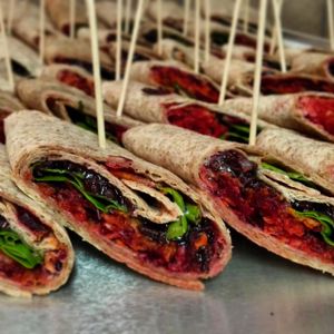 Wraps with black rice, tomato-hummus, beet salad and tahini dressing.  at Ficus in Oslo