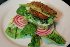 Chickpea-bread sandwich with pesto and cashew cheese. at Ficus in Oslo
