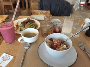 granola, pancakes, coffee, and smoothie at Le Potager de Charlotte in Paris