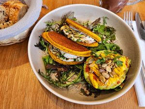 Savory chickpea flour pancakes with cashew cream and "hard boiled egg" style avocado at Le Potager de Charlotte in Paris